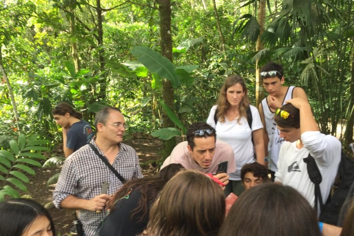 a group of people standing in front of a crowd