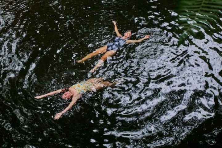 a man swimming in the water