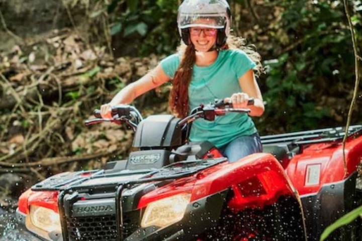 a person riding on the back of a motorcycle